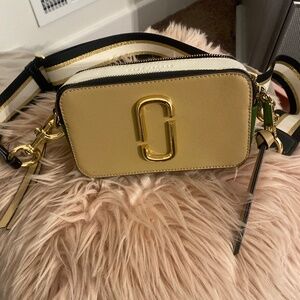 Marc Jacob sling shot bag.